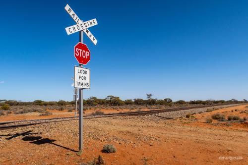 Railway crossing in the desert of Australia